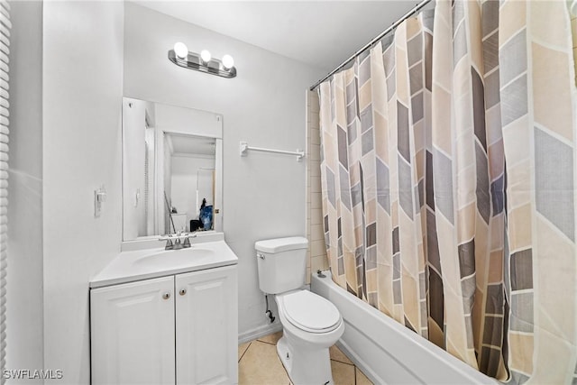 full bathroom with shower / bath combo with shower curtain, tile patterned floors, toilet, and vanity