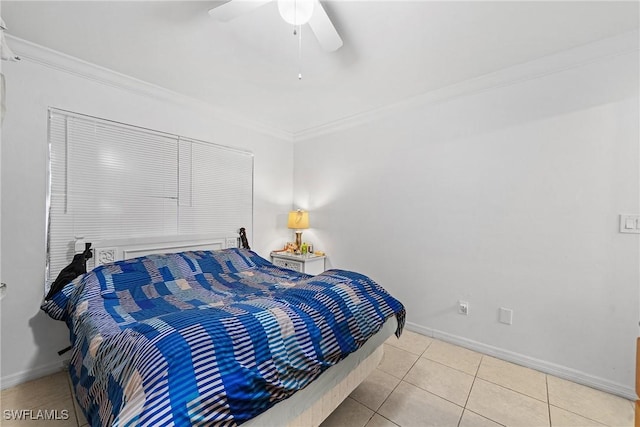 bedroom with light tile patterned floors, crown molding, and ceiling fan