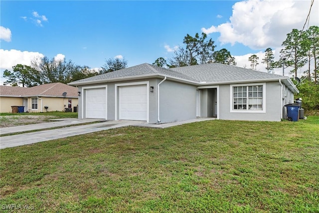 ranch-style house with a garage and a front lawn