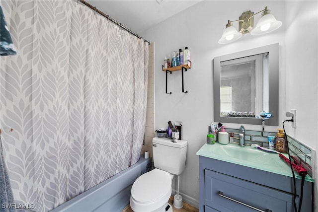 full bathroom featuring vanity, shower / tub combo with curtain, and toilet