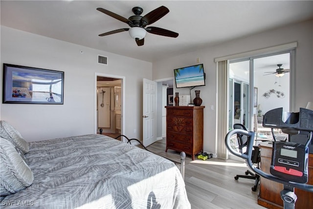 bedroom with access to outside, ensuite bathroom, ceiling fan, and light wood-type flooring