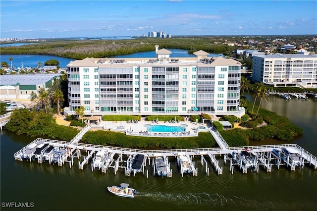 birds eye view of property featuring a water view