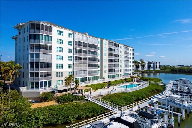 view of building exterior featuring a water view