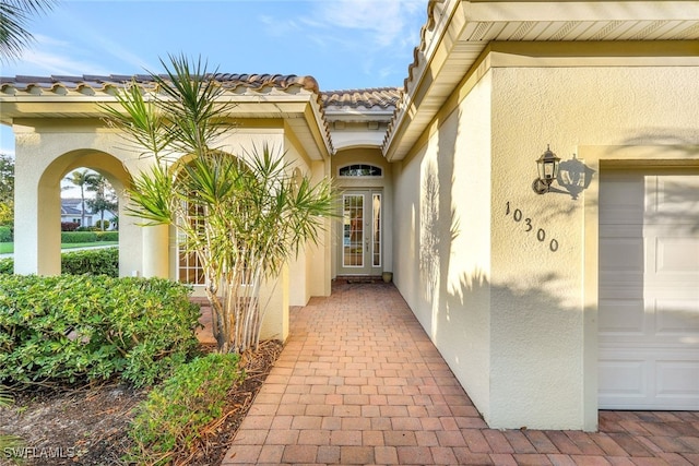 entrance to property featuring a garage