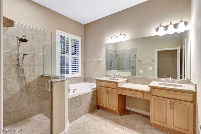 bathroom featuring vanity, separate shower and tub, and tile patterned floors