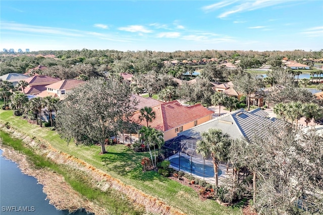 bird's eye view with a water view