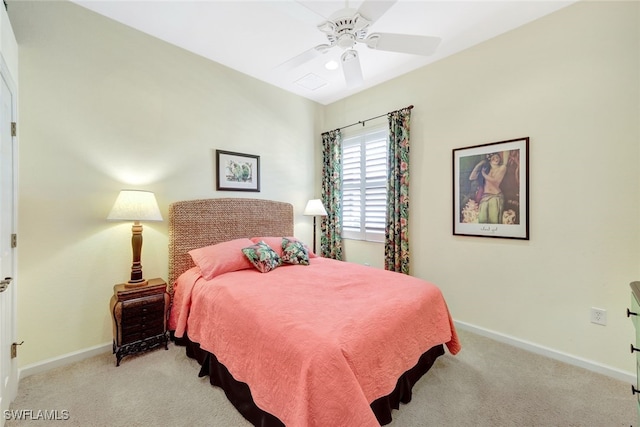 bedroom featuring light colored carpet and ceiling fan