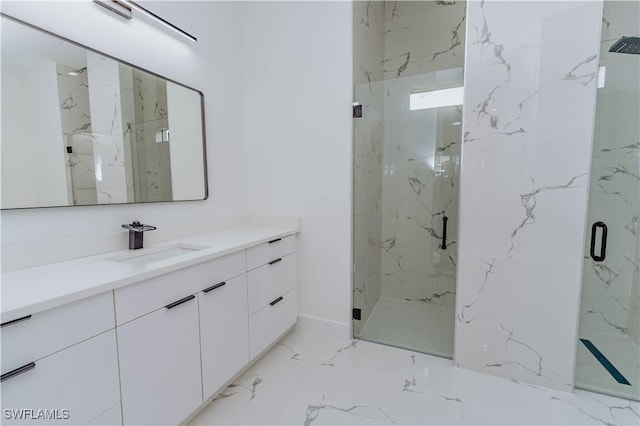 bathroom with vanity and an enclosed shower