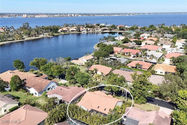 drone / aerial view featuring a water view