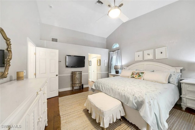 bedroom with connected bathroom, wood-type flooring, high vaulted ceiling, and ceiling fan