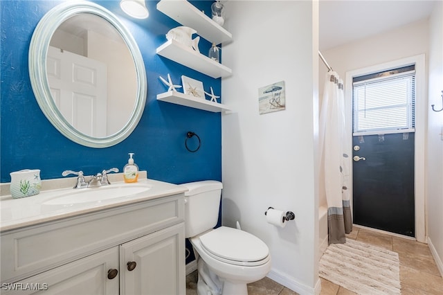 full bathroom with tile patterned flooring, vanity, shower / tub combo with curtain, and toilet