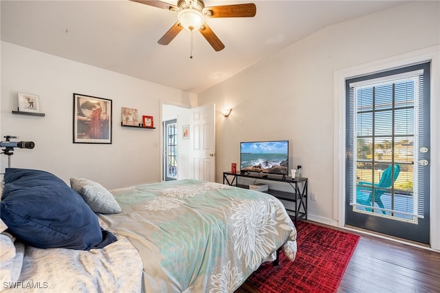 bedroom with ceiling fan, lofted ceiling, hardwood / wood-style floors, and access to outside