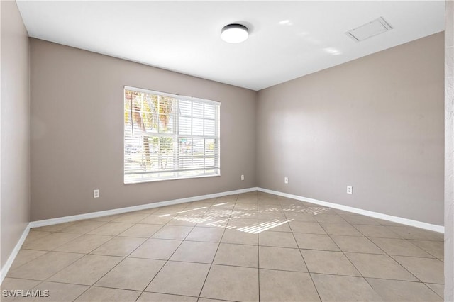 view of tiled spare room