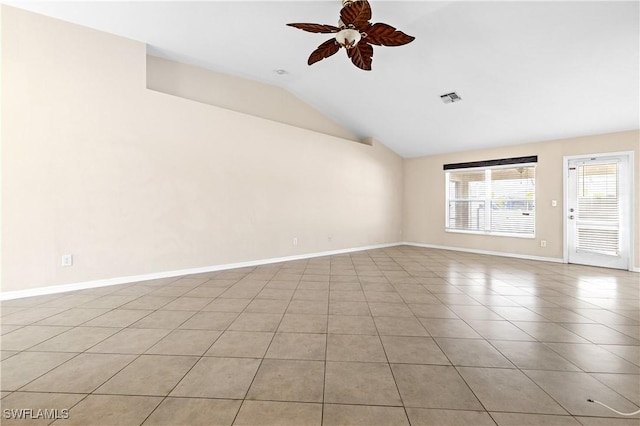 unfurnished room featuring vaulted ceiling, ceiling fan, and light tile patterned flooring