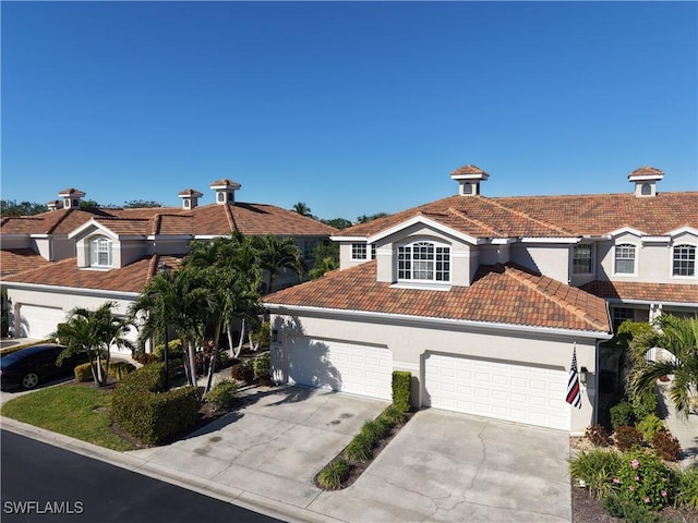 view of front of property with a garage