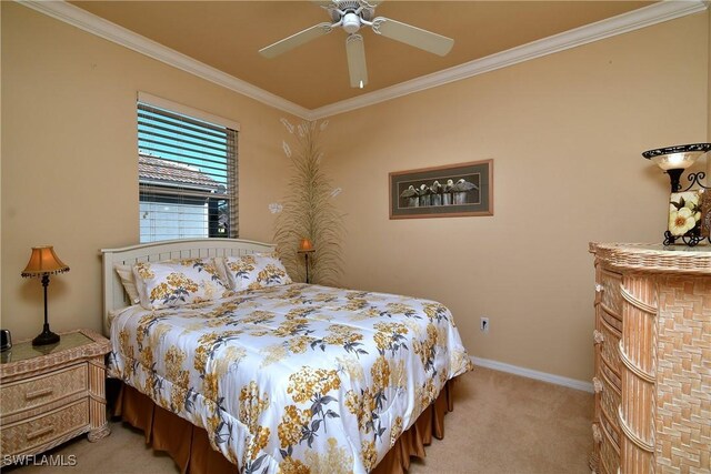 bedroom with crown molding, ceiling fan, and light carpet