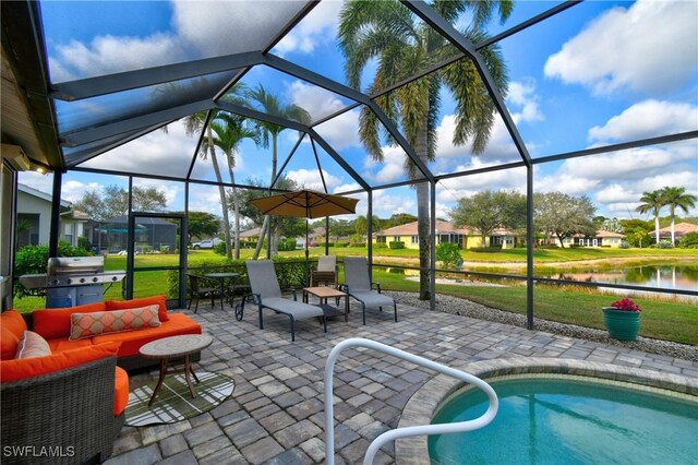 view of swimming pool with a water view, grilling area, outdoor lounge area, and a lanai