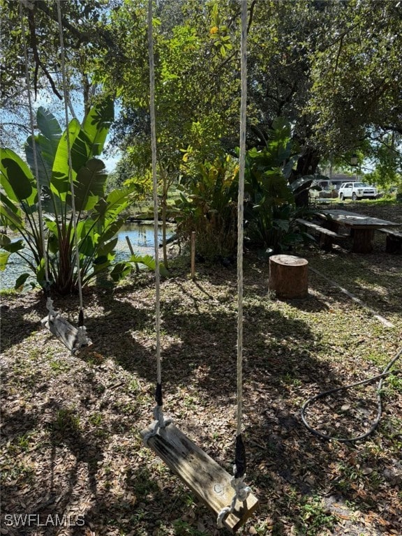 view of yard with a water view