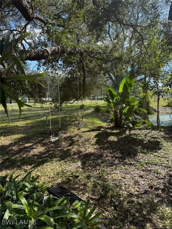 view of yard with a water view