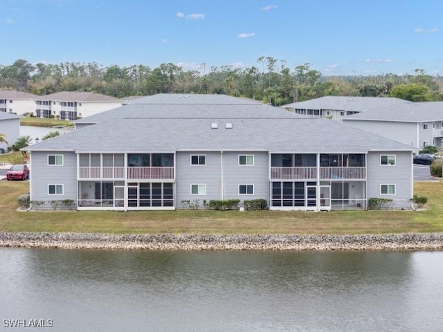 view of building exterior featuring a water view