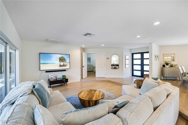 living room featuring light hardwood / wood-style floors