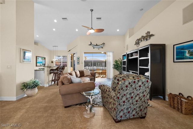 living room with ceiling fan, high vaulted ceiling, and light tile patterned floors