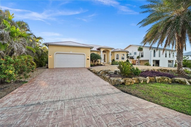 view of front of home featuring a garage