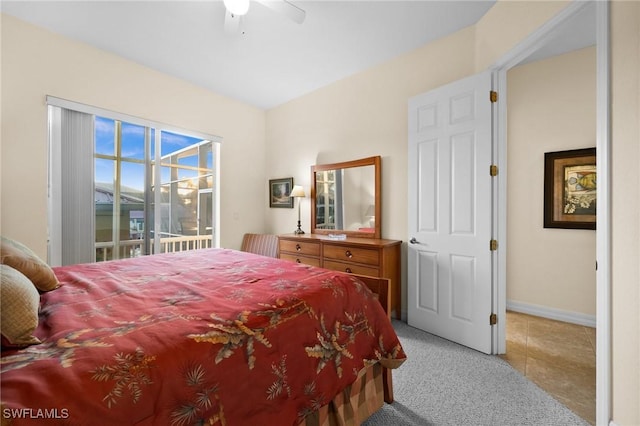 bedroom with light colored carpet and ceiling fan