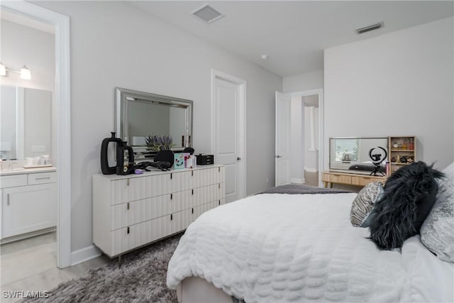 bedroom with ensuite bath