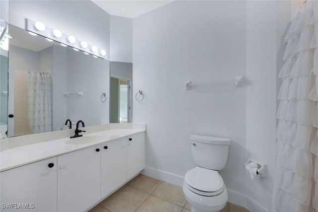 bathroom featuring tile patterned flooring, vanity, toilet, and a shower with shower curtain