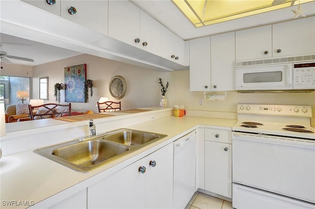 kitchen featuring white cabinetry, white appliances, ceiling fan, and sink