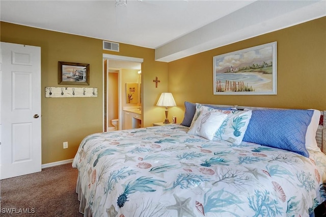 bedroom featuring carpet floors, visible vents, and baseboards