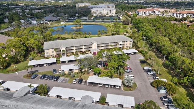 drone / aerial view with a water view