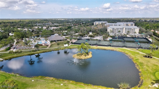 birds eye view of property with a water view