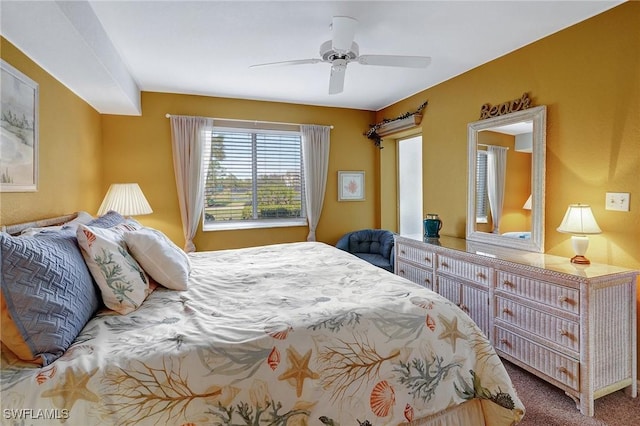 bedroom with carpet floors and a ceiling fan