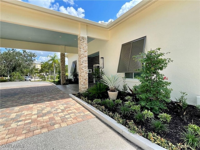 exterior space featuring stucco siding