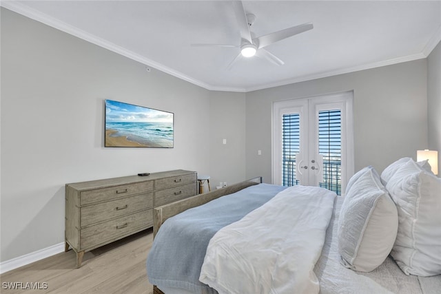 bedroom with baseboards, light wood-style flooring, ornamental molding, access to outside, and french doors