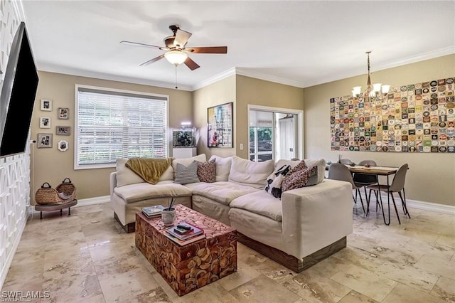 living room featuring ornamental molding and ceiling fan with notable chandelier