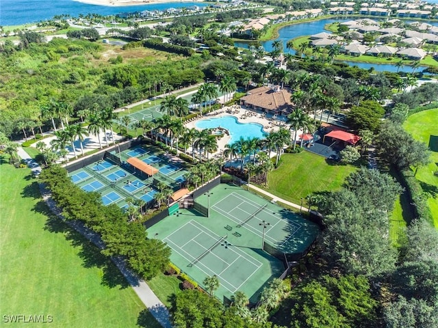 birds eye view of property featuring a water view