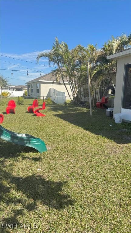 view of yard with a playground