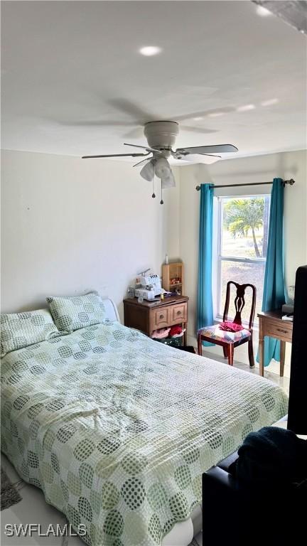 bedroom featuring ceiling fan