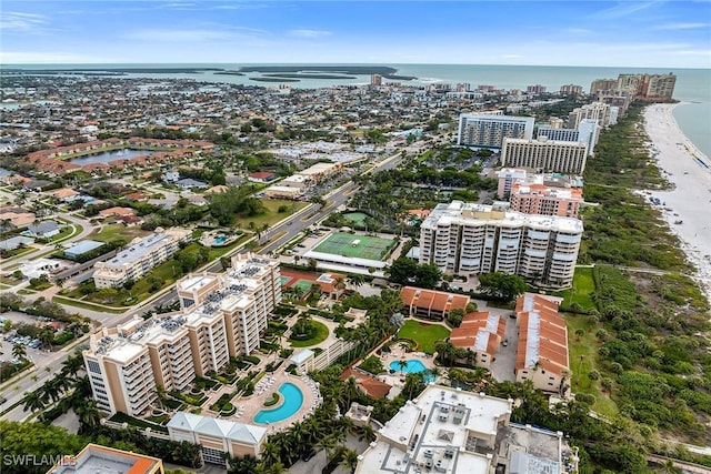 aerial view featuring a water view and a beach view