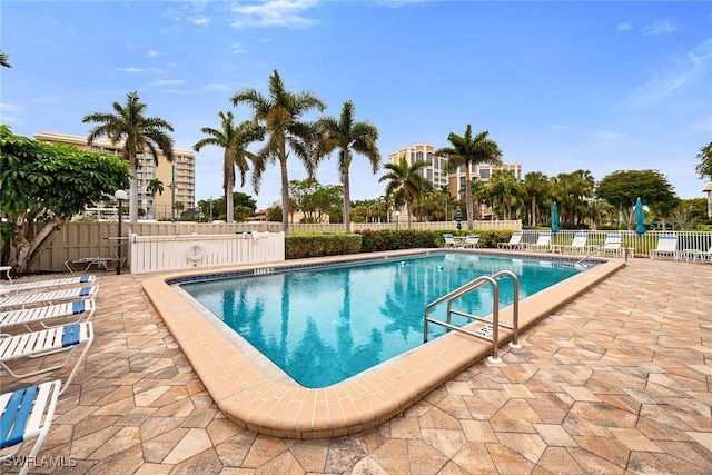 view of swimming pool with a patio area