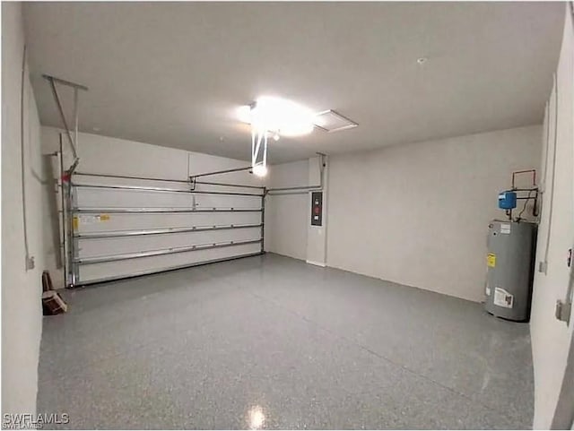 garage with electric panel and water heater