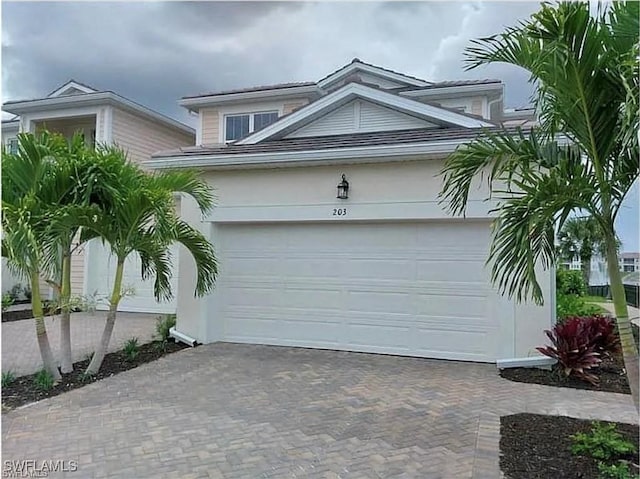 view of front of property featuring a garage