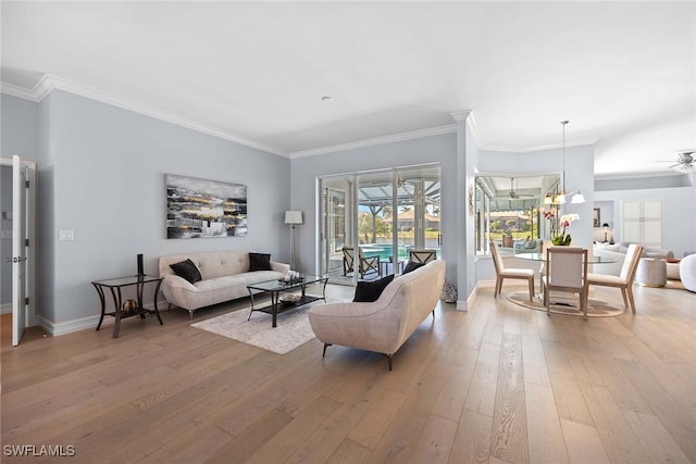 living room featuring ornamental molding and hardwood / wood-style floors