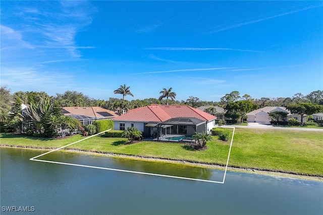 drone / aerial view with a water view