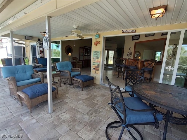 view of patio with an outdoor hangout area and ceiling fan