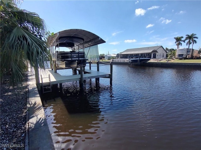 dock area featuring a water view