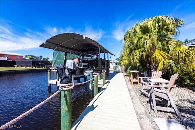 view of dock with a water view